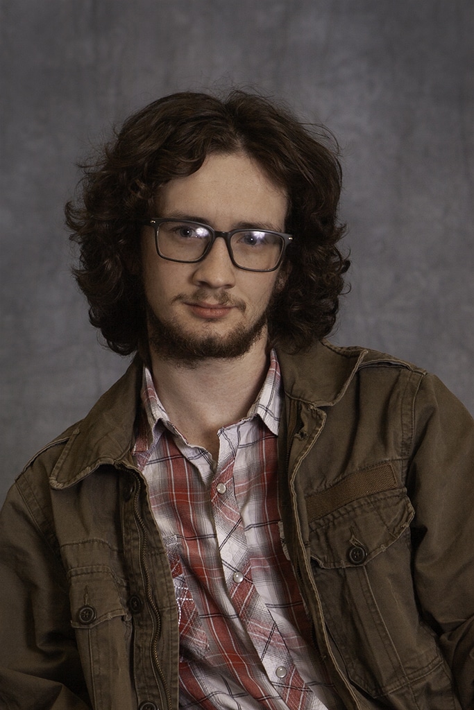 Headshot of Youth Services Assistant, Conor