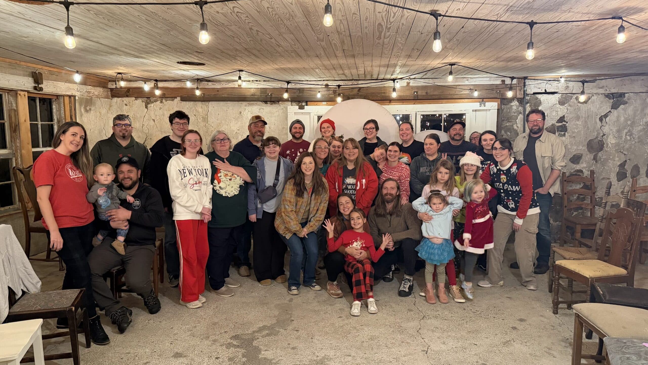 Staff smiling at the 2025 holiday party