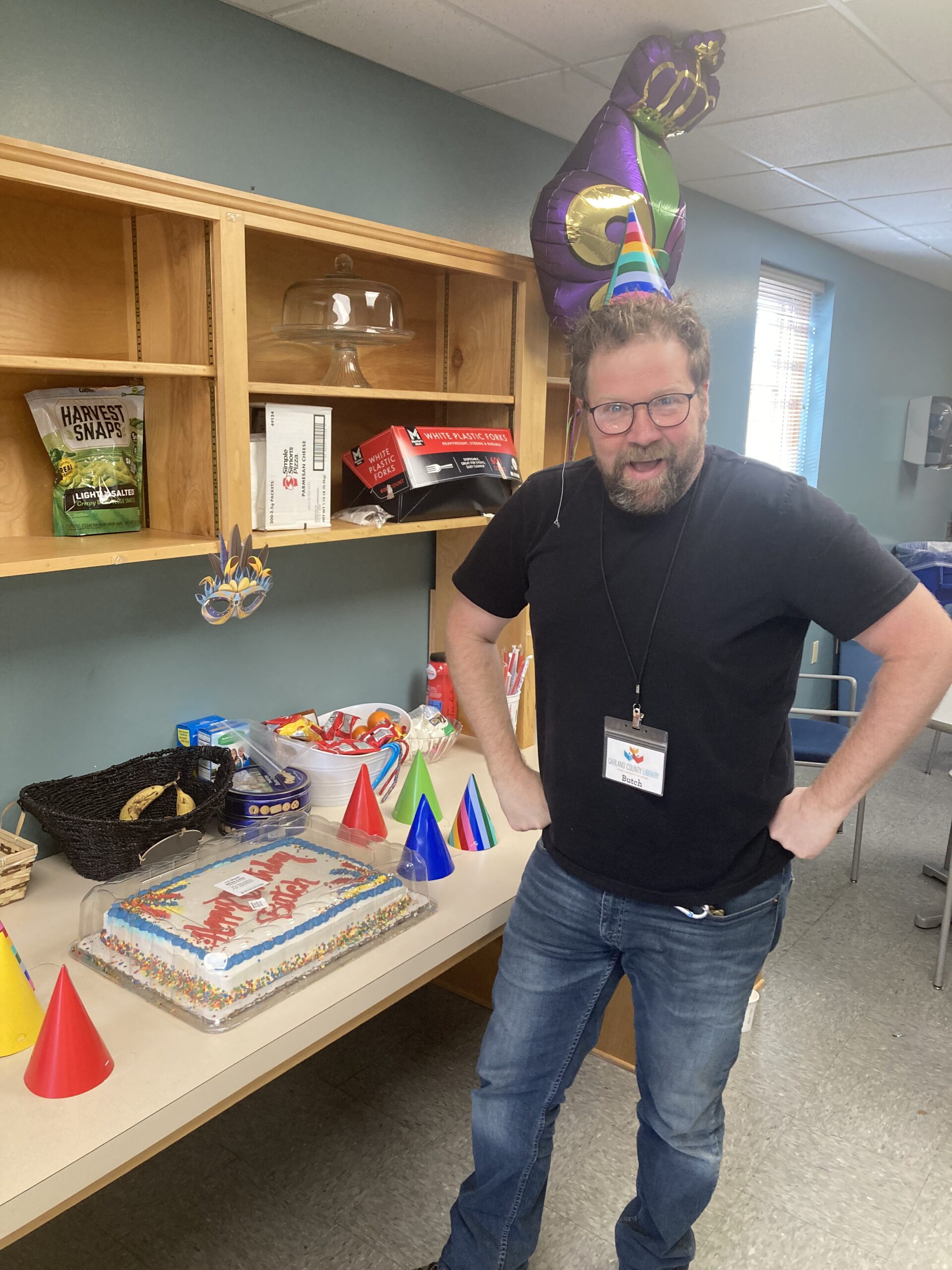 Butch celebrates his birthday with cake and a silly little hat.