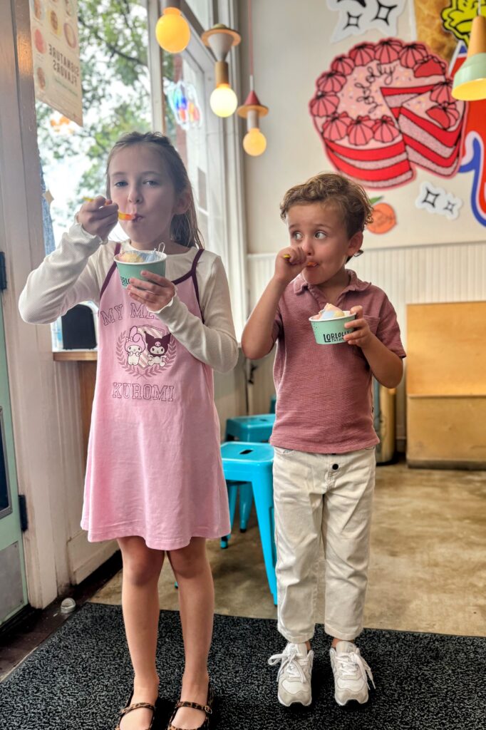 Two children eating ice cream